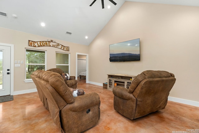 living room featuring high vaulted ceiling and ceiling fan