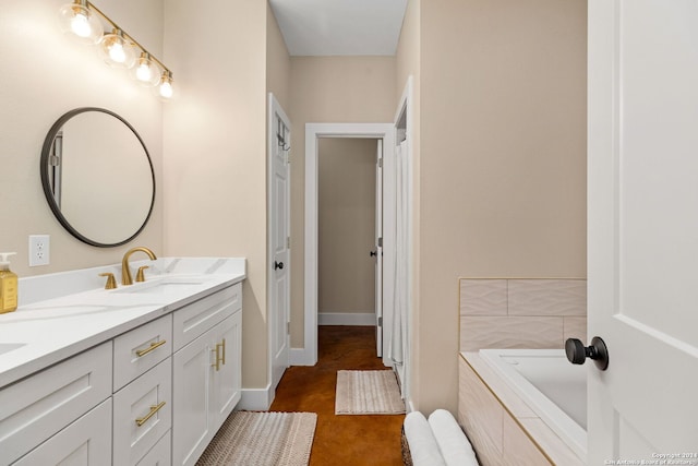 bathroom featuring a tub and vanity