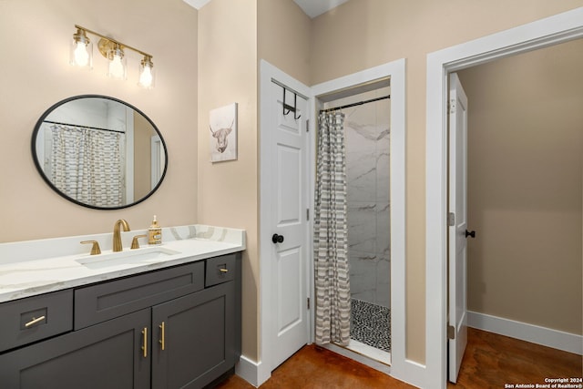 bathroom featuring vanity and walk in shower