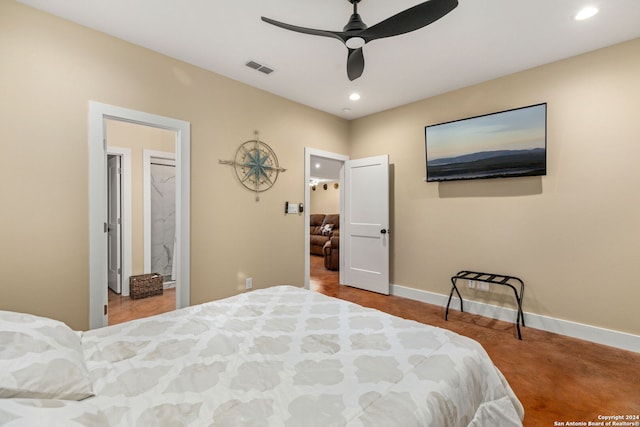 bedroom featuring ceiling fan and ensuite bathroom