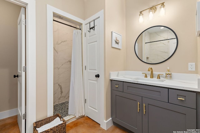 bathroom featuring vanity and a shower with curtain