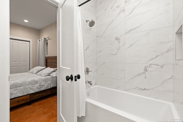 bathroom featuring shower / bath combo with shower curtain