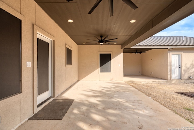 view of patio featuring ceiling fan