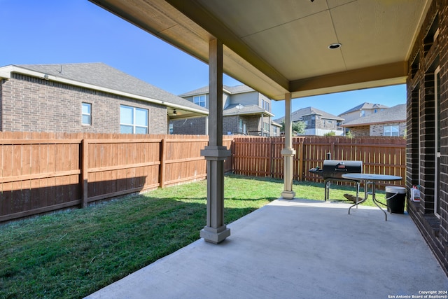 view of patio with a grill