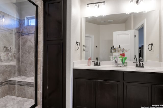 bathroom featuring vanity and walk in shower