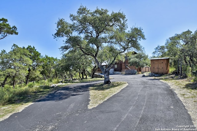 view of road featuring driveway