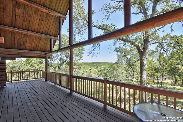 deck with a forest view