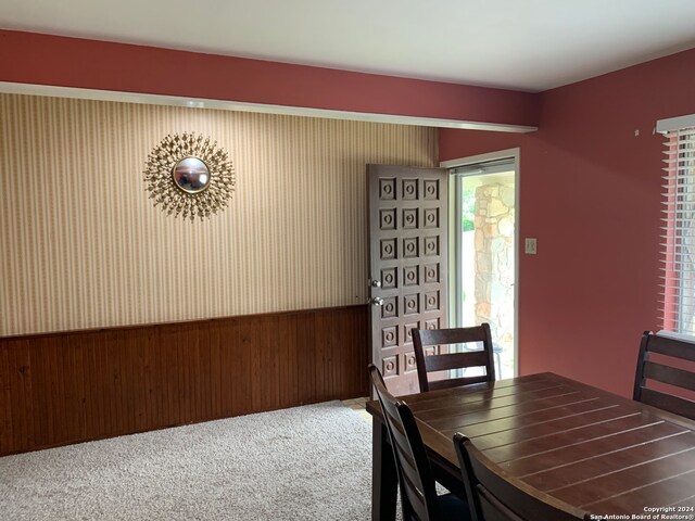 dining space featuring carpet floors