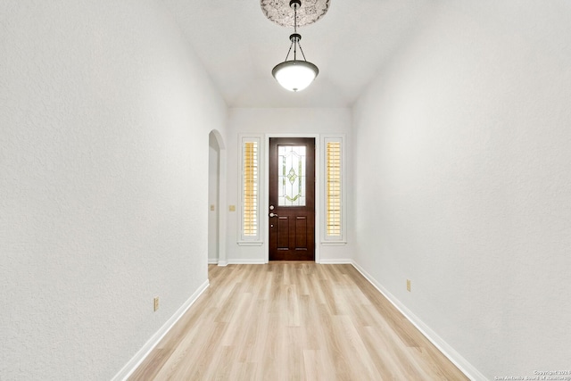 foyer with light hardwood / wood-style floors