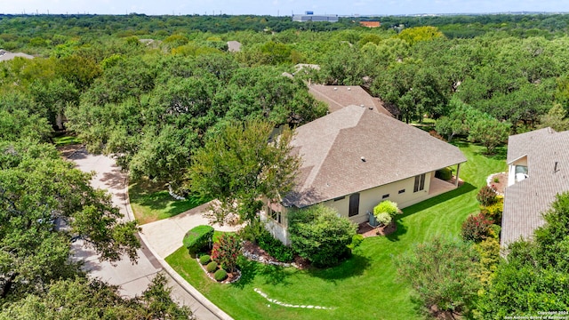 bird's eye view featuring a view of trees