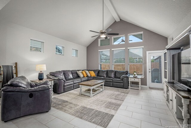 tiled living room with a textured ceiling, high vaulted ceiling, beam ceiling, and ceiling fan