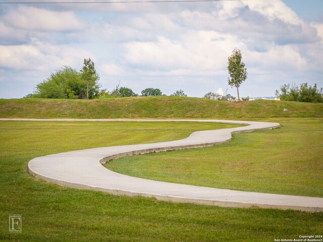 surrounding community with a lawn