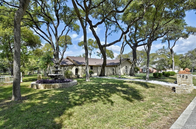 view of front facade with a front yard