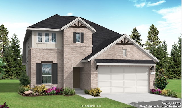 view of front of house featuring a garage and a front yard