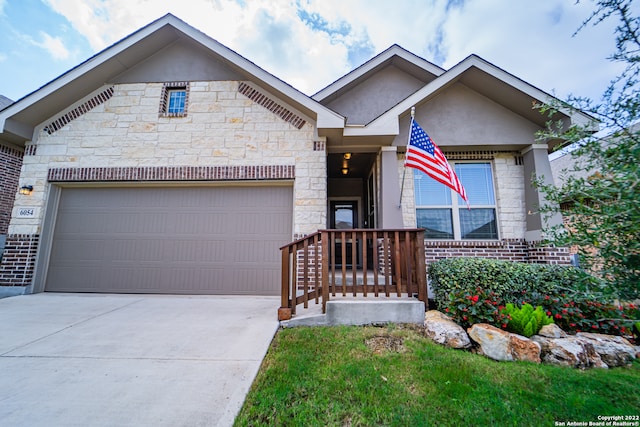 view of front of property featuring a garage