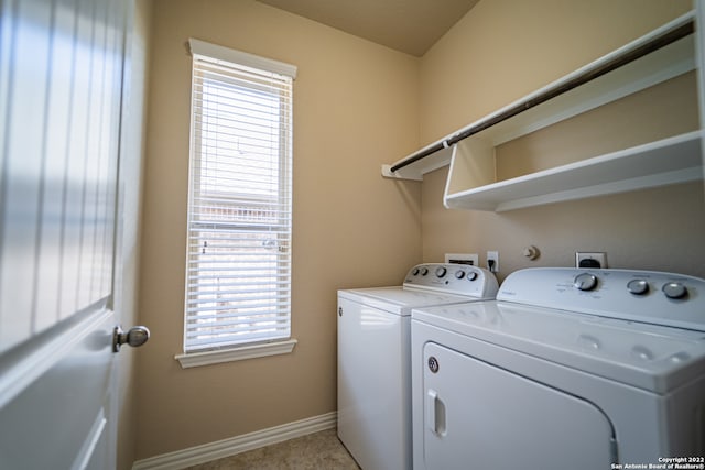 laundry room featuring separate washer and dryer