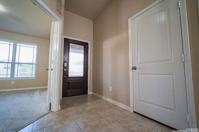 view of tiled entrance foyer