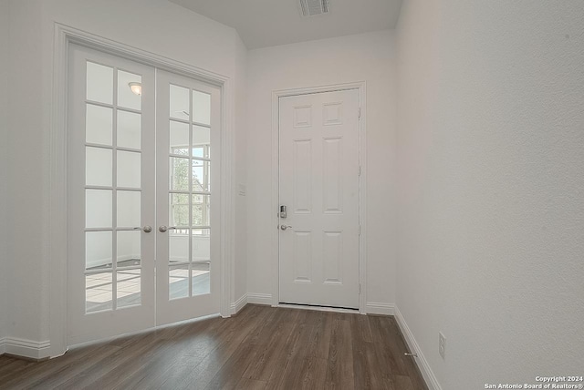 doorway featuring dark wood-type flooring