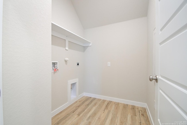 clothes washing area with hookup for an electric dryer, washer hookup, hookup for a gas dryer, and light hardwood / wood-style flooring