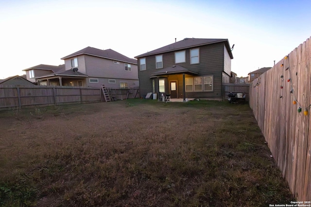 8446 Buckhorn Parke, San Antonio, TX 78254 - back of house featuring a lawn and a fenced backyard