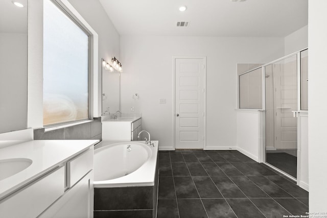 bathroom featuring tile patterned floors, vanity, and independent shower and bath