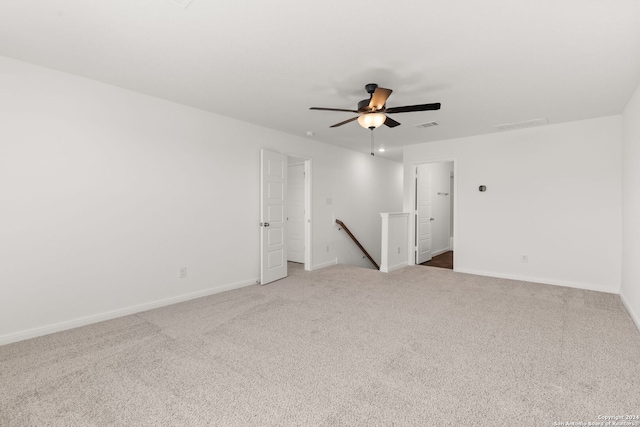 unfurnished room featuring carpet and ceiling fan