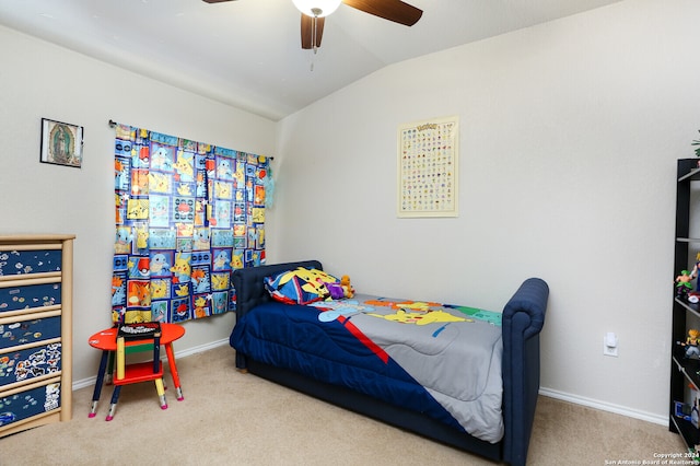 bedroom featuring lofted ceiling, carpet flooring, and ceiling fan