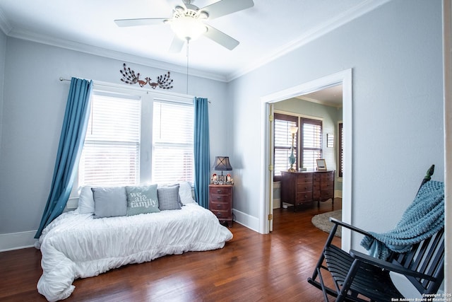 bedroom with ornamental molding, dark wood-type flooring, and ceiling fan