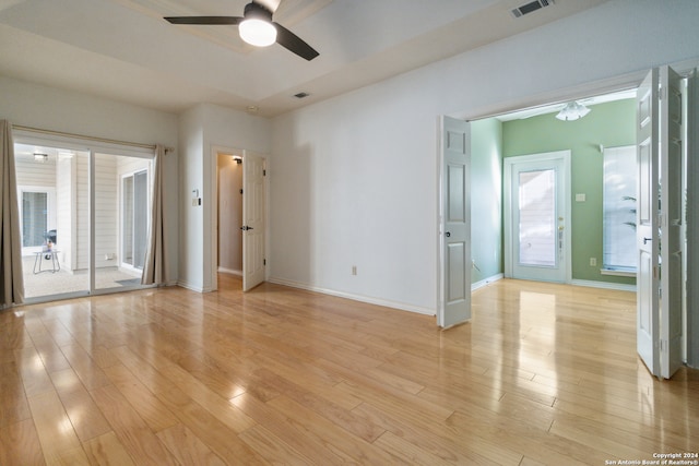 unfurnished room featuring ceiling fan and light hardwood / wood-style floors