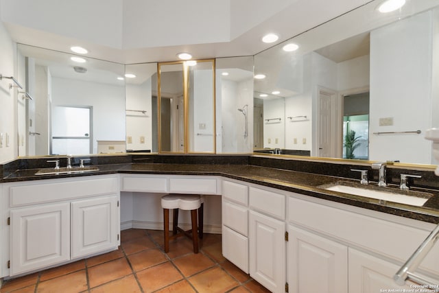 bathroom with vanity and tile patterned flooring