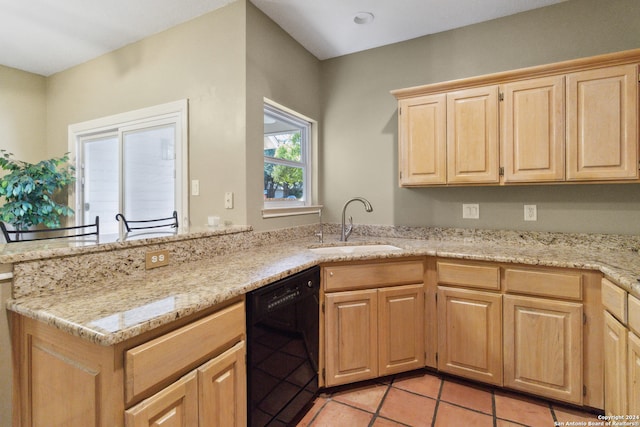 kitchen with dishwasher, light stone counters, kitchen peninsula, sink, and light brown cabinets