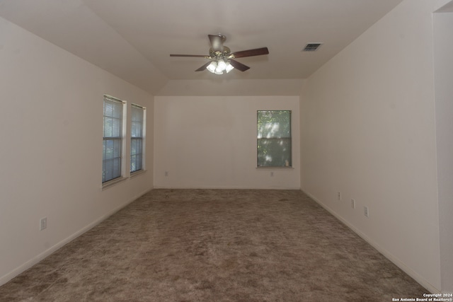 spare room with ceiling fan and carpet floors