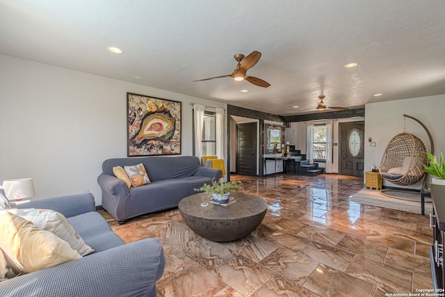 living room featuring ceiling fan