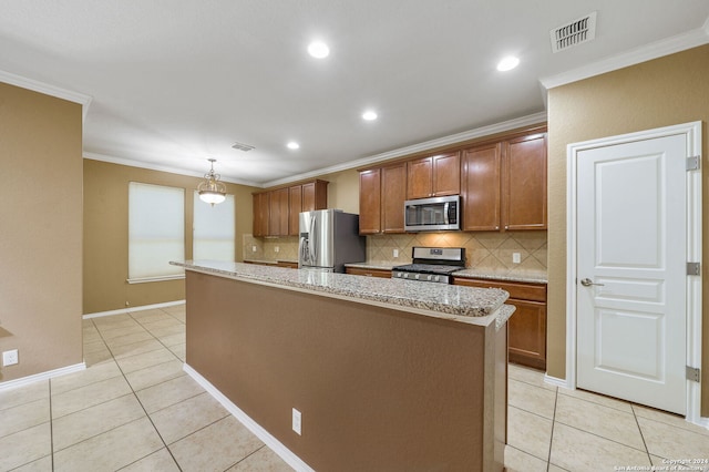 kitchen featuring light tile patterned floors, a center island, appliances with stainless steel finishes, pendant lighting, and tasteful backsplash