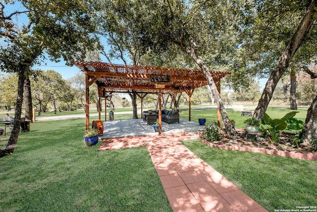 surrounding community with a pergola, a patio area, and a yard