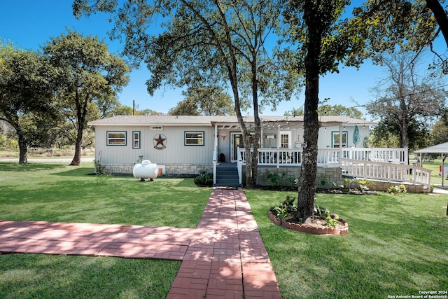 1350 Blue Quail Dr, Lytle, TX 78052 - single story home featuring a front yard