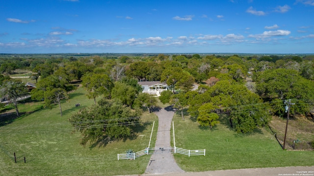 birds eye view of property featuring a rural view