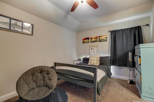 bedroom featuring vaulted ceiling, ceiling fan, and carpet floors