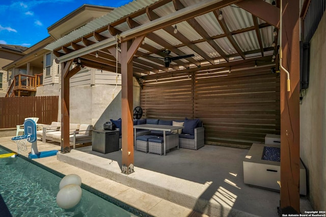 view of patio with a fenced in pool, an outdoor hangout area, and ceiling fan