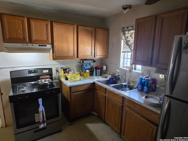 kitchen featuring appliances with stainless steel finishes and sink