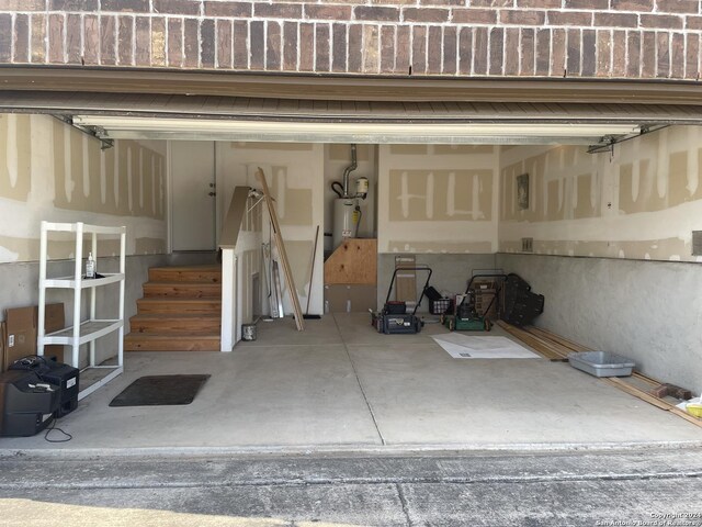 garage featuring gas water heater