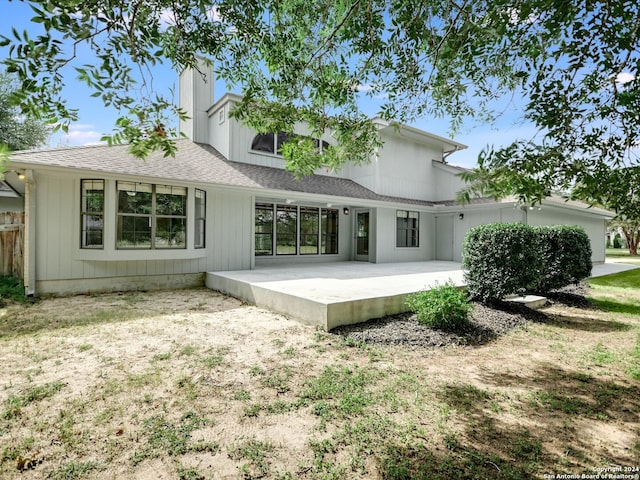 rear view of house with a patio area