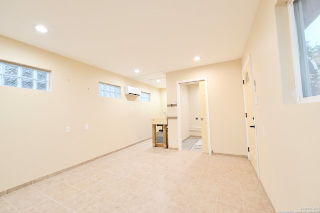 basement featuring a wall mounted AC