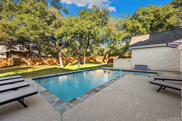 back of house featuring a patio area, a yard, and a gazebo