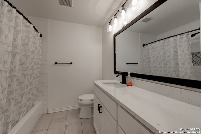 full bathroom with tile patterned flooring, toilet, shower / tub combo, and vanity