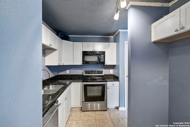 kitchen with white cabinets, crown molding, sink, and appliances with stainless steel finishes