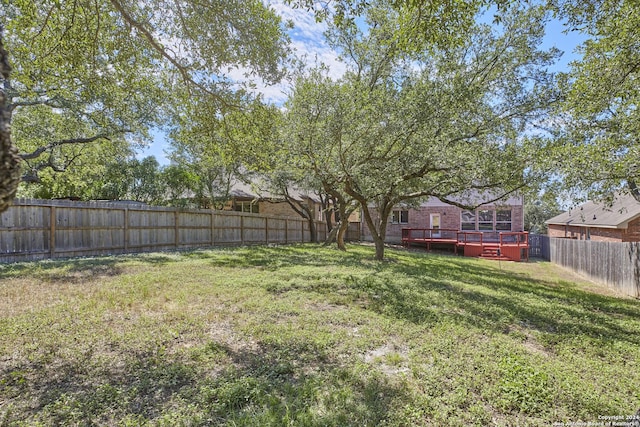 view of yard featuring a deck