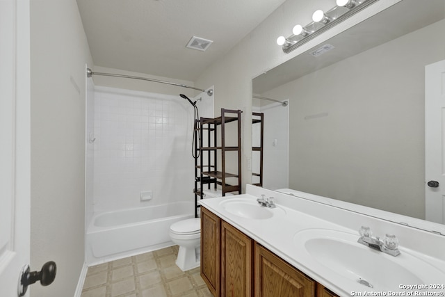 full bathroom featuring vanity, toilet, and shower / washtub combination