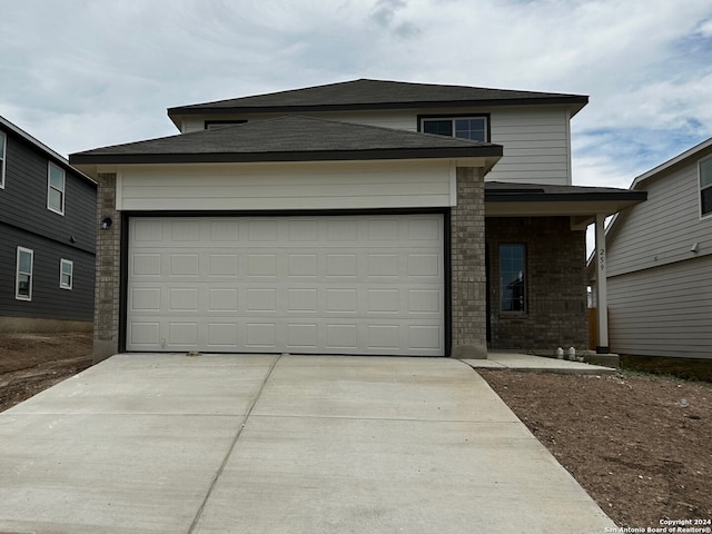 view of front of house with a garage