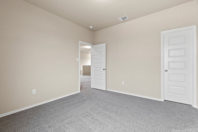 spare room with carpet flooring